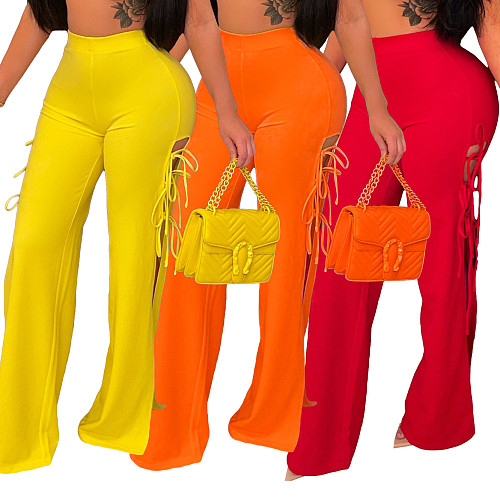 Solid Color Side Hollow Out Lace Up Flare Pants ML-7470