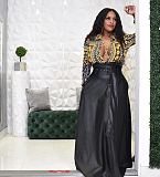 Ladies Solid Color Irregular PU Leather Long Skirt OD-8339