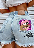 Mouth Biting Finger Print Fashionable Ripped Denim Shorts For Women