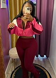 Colorblocked Navel-Baring Zip-Up Top And High-Waisted Flared Trousers Two-Piece Set