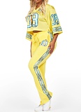 Fashion V-Neck Net Eye Letter Print Top Slightly Flared Pants Two-Piece Suit For Women