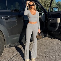 Fashionable Midriff-baring Long-sleeved Top With Waist-cinching Solid Color Wide-leg Pants Suit BLG-20181