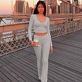 Fashionable Midriff-baring Long-sleeved Top With Waist-cinching Solid Color Wide-leg Pants Suit BLG-20181