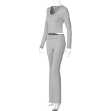 Fashionable Midriff-baring Long-sleeved Top With Waist-cinching Solid Color Wide-leg Pants Suit BLG-20181