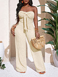 Vacation-Style Textured Strapless Wide-Leg Jumpsuit With Bow Detail HANI-029
