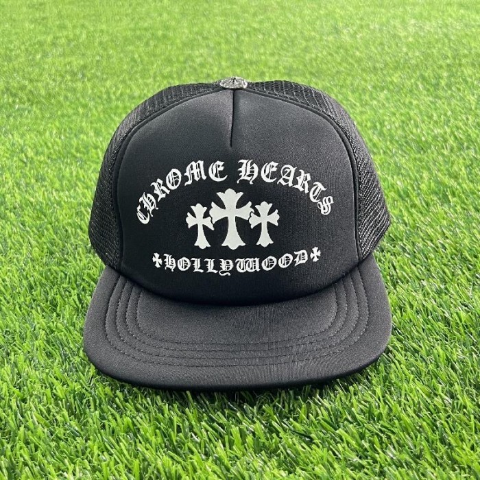 Sanskrit letter cross trucker hat