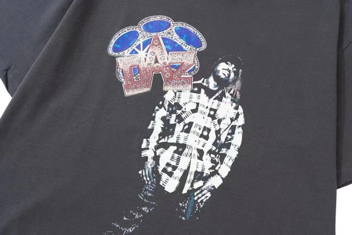 Washed and aged character print tee