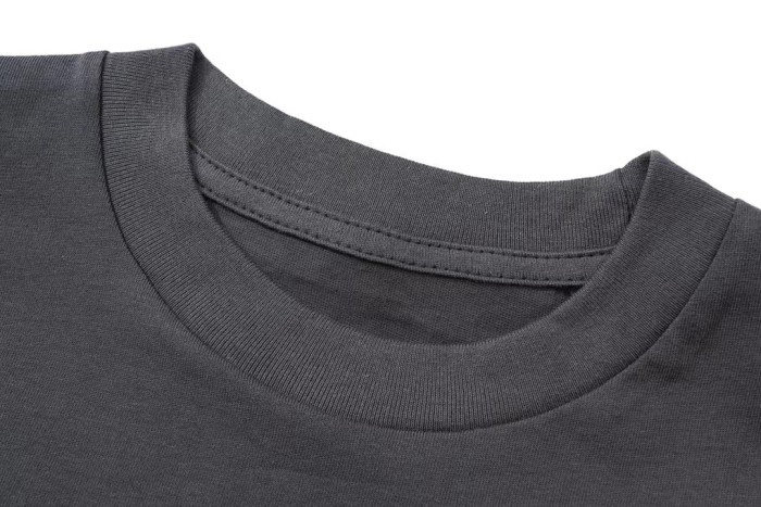 Washed and aged character print tee