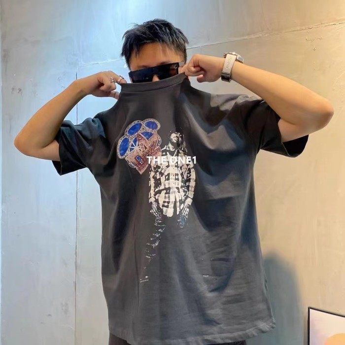 Washed and aged character print tee