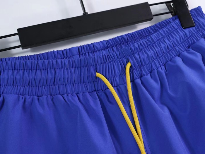 Men's logo printed letters side color blocking sports shorts