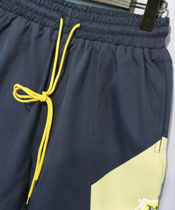 Letters coconut tree print color blocking sports shorts