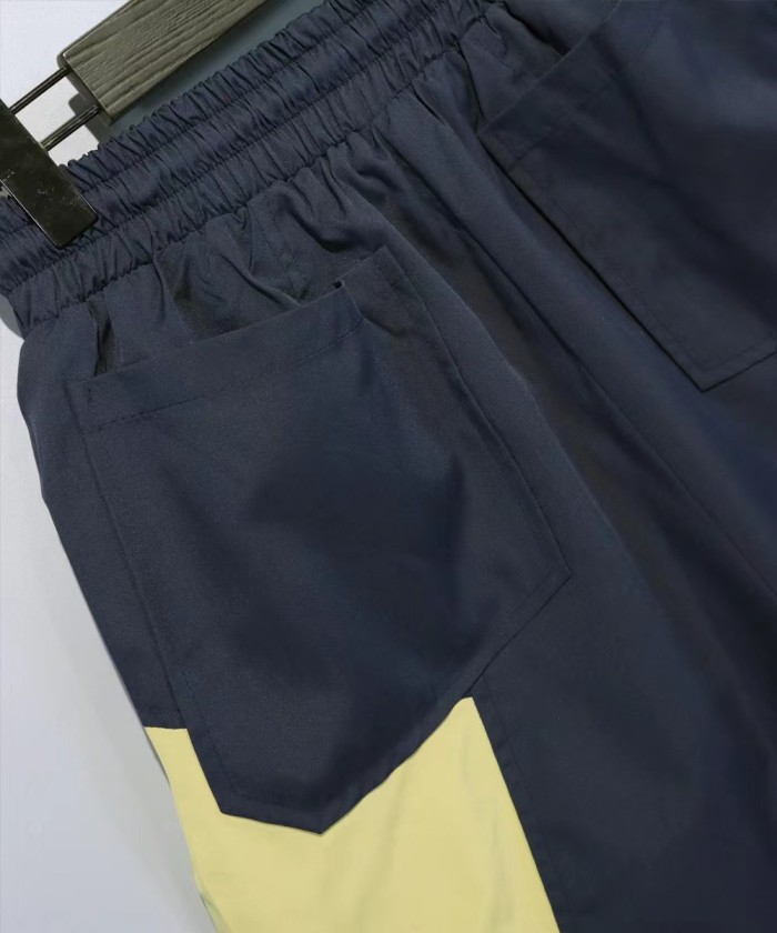 Letters coconut tree print color blocking sports shorts