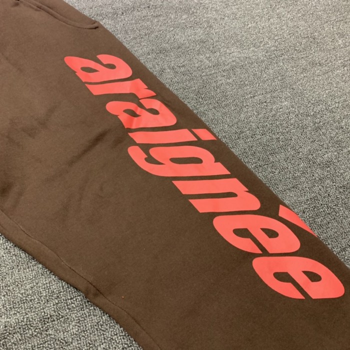 Orange letters scattered small stars foam printed sweatpants