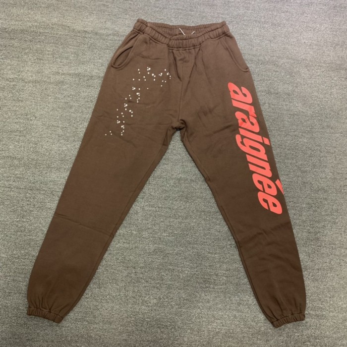 Orange letters scattered small stars foam printed sweatpants