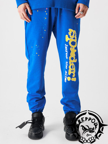 Left leg yellow monogrammed pants