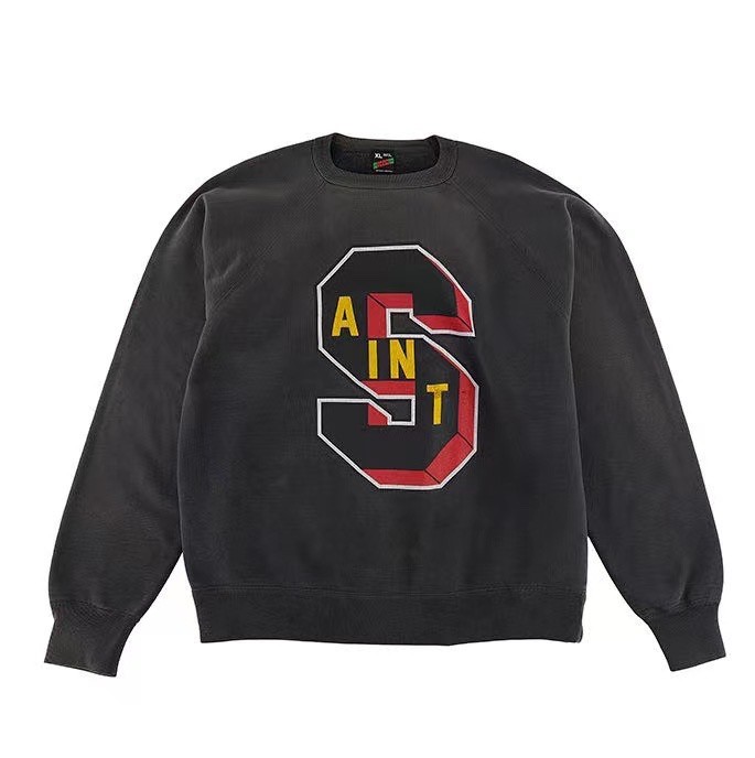 Washed and distressed monogrammed crew neck sweatshirt