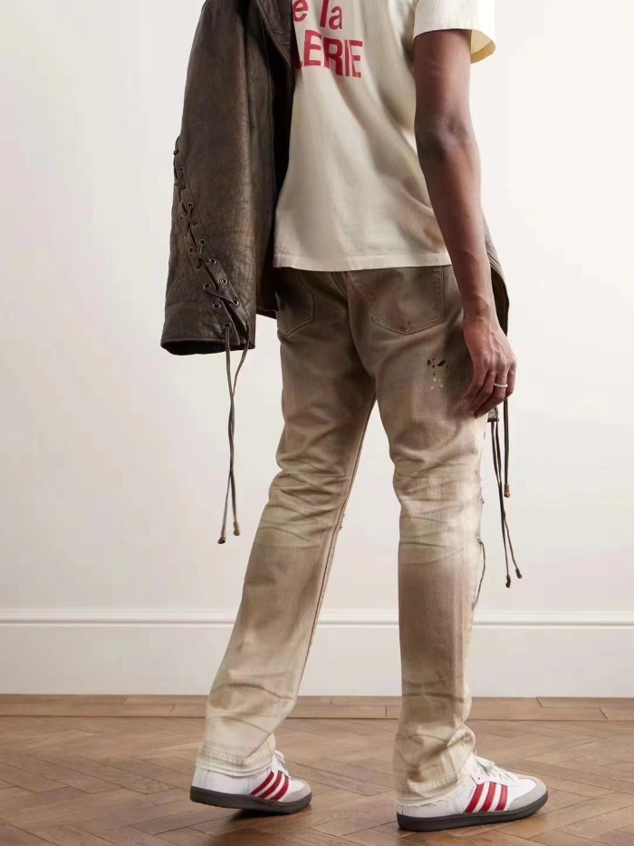 1:1 quality version Slashed and frayed dirty hand-painted ink dot jeans