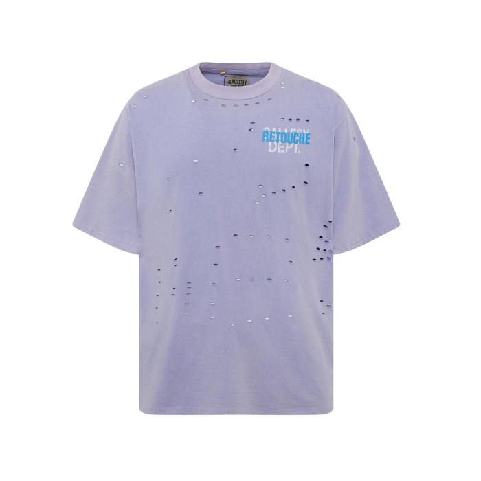 Lots of ripped blue and white letters overlapping Tee