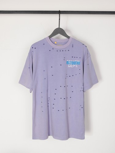 Lots of ripped blue and white letters overlapping Tee