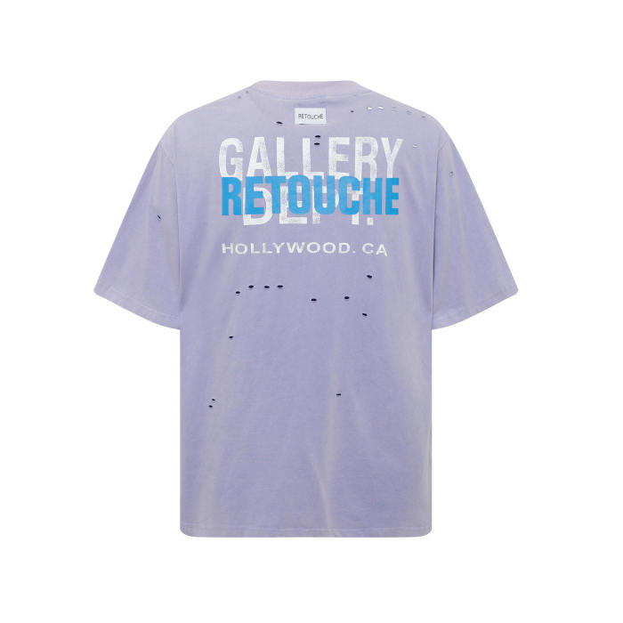 Lots of ripped blue and white letters overlapping Tee
