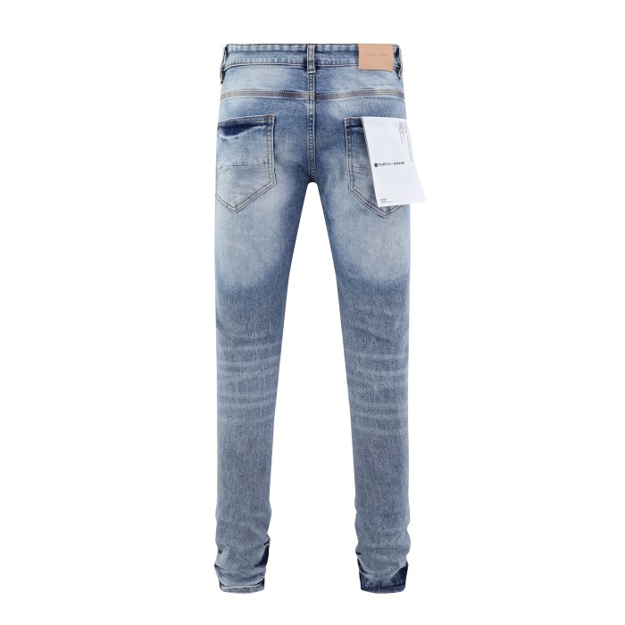 Irregular large ripped jeans