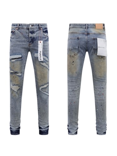 Scuffed and patched vintage jeans