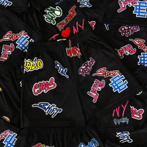 27956111 Graffiti Letter Print Mesh Shorts