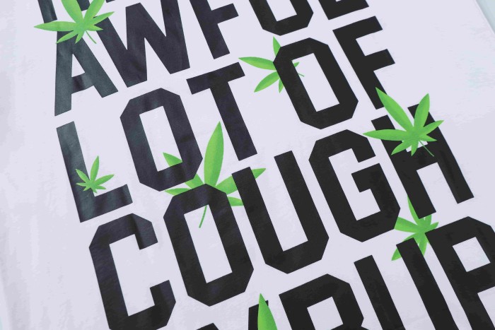 Minimal Street Green Hemp Leaf Accent Horizontal Slogan Front Large Vertical Bold Segmented Letter Tee 2 colors 29302254