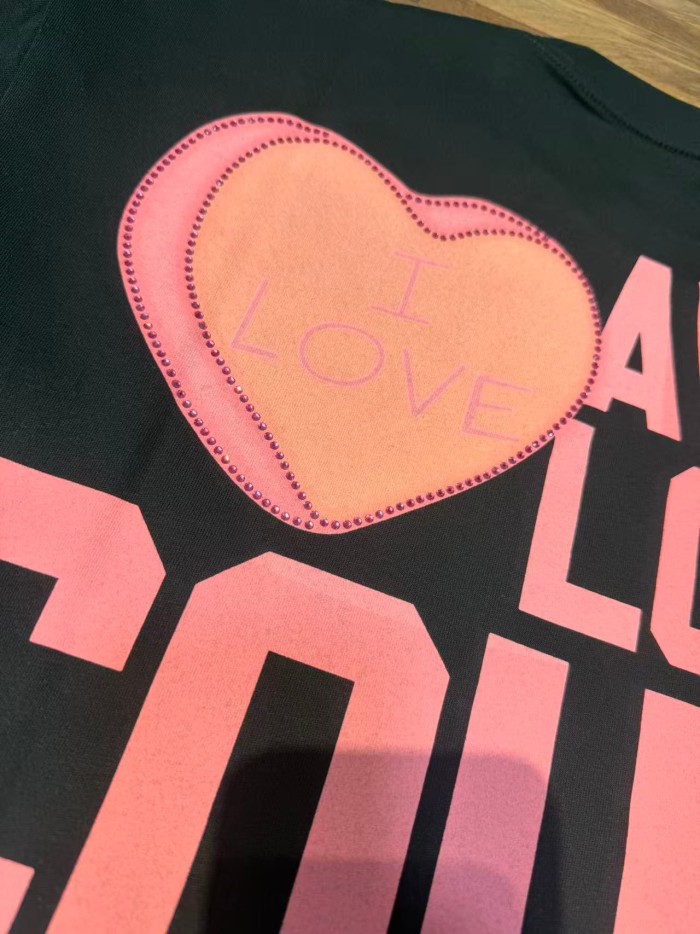 Romantic Street Rhinestone Dot Cupid Holding Syrup Bottle Heart Slogan Print Front Large Layered Stacked Bold Letter Tee 2 colors 29302161