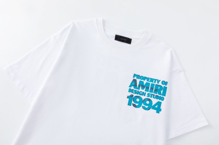 Gradient Blue PROPERTY OF AMIRI 1994 Text Back Large Distressed Bold Block Letter Tee 2 colors 29307012