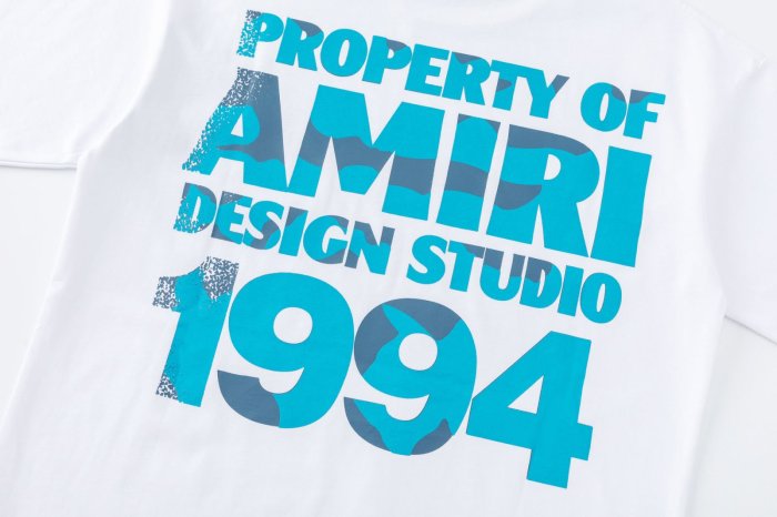 Gradient Blue PROPERTY OF AMIRI 1994 Text Back Large Distressed Bold Block Letter Tee 2 colors 29307012