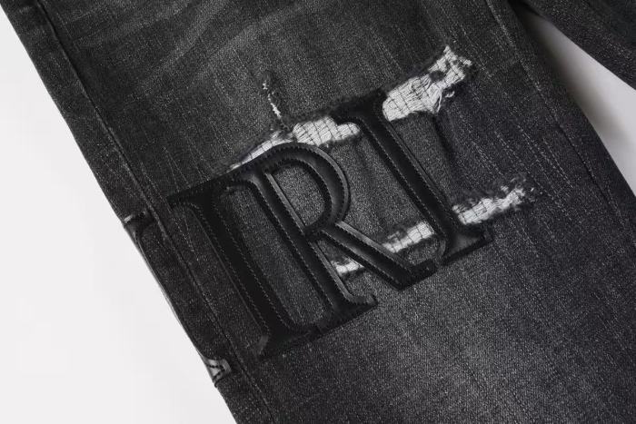 Amiri 1:1 quality version Wash Black Leather Letter Patch Mesh Underlay Frayed Ripped Jeans 29474963