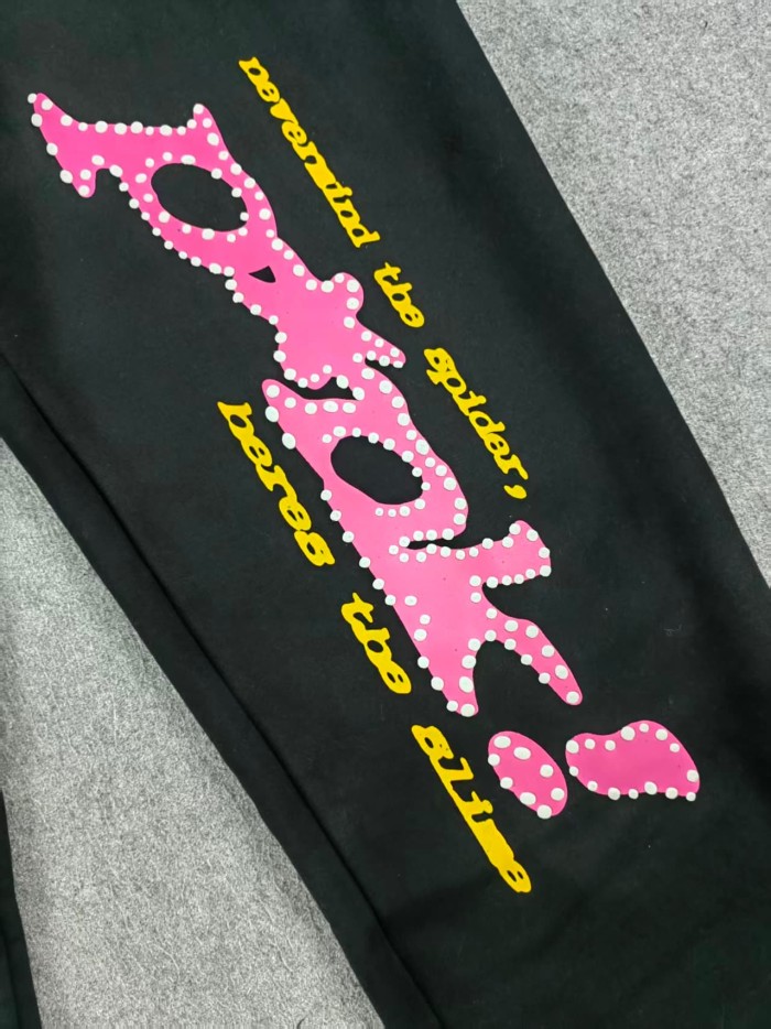 Sp5der Young ThugSp5der pink letters logo black pants